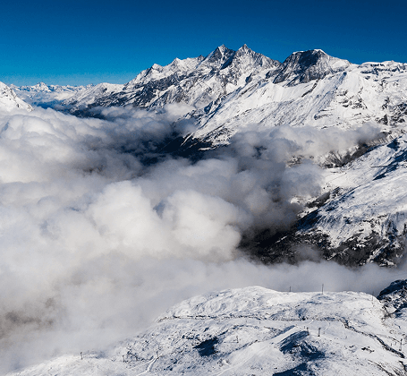 Clouds and snow-covered mountains above the Khumbu Icefall