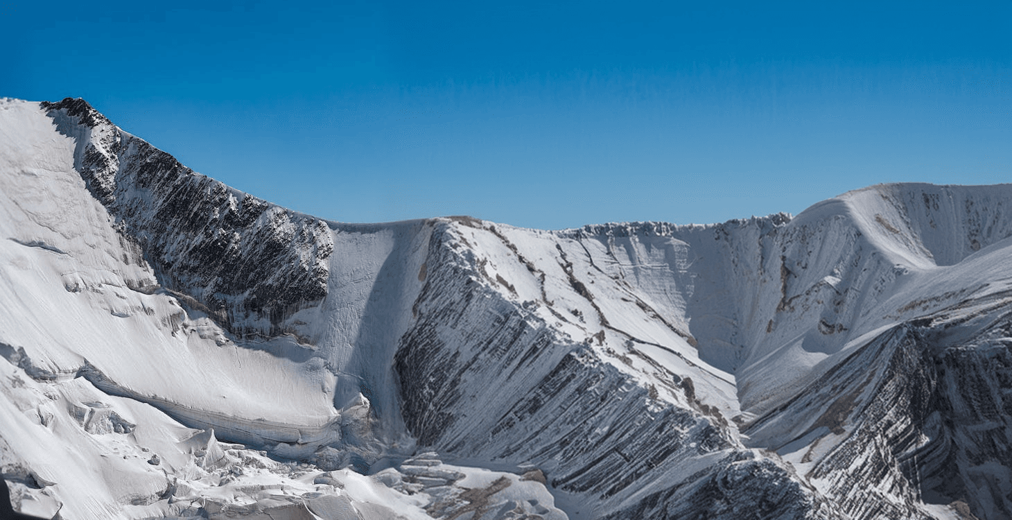 Snow-covered Khumbu mountain landscape used as the trek planning section background