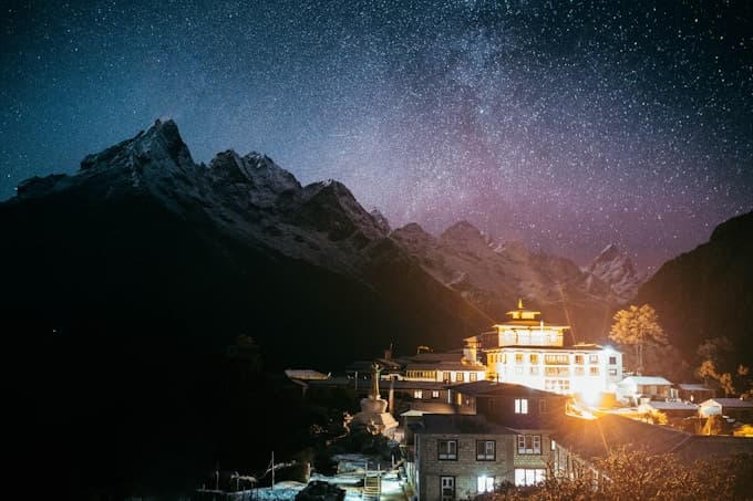 Tengboche Monastery glowing under a starlit Himalayan sky